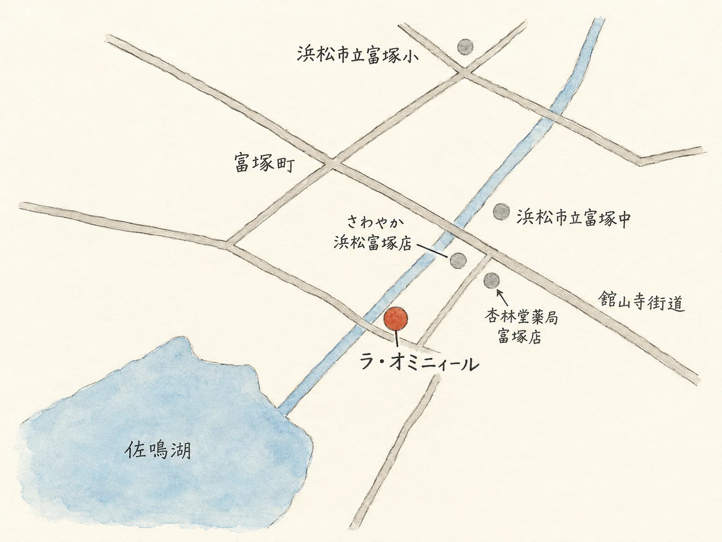 佐鳴湖、富塚町、浜松市立富塚小学校・富塚中学校、さわやか浜松富塚店、杏林堂薬局富塚店とLa OMINNIRの位置関係を示した手描き風案内図